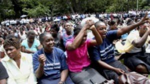 Civil servants protest delayed pay / Credit AP