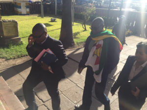 Pastor Evan Mawarire arrives at Harare Central Police Station July 12, 2016