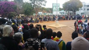 Prayer circle at Harare Magistrate's Court as public wait for Pastor Evan Mawarire hearing